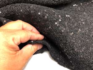 Uld bouclé - sort med pailletter